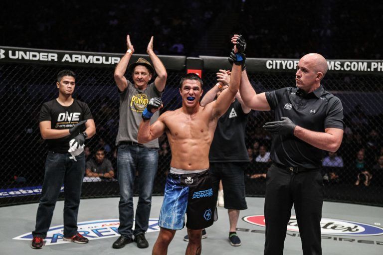 Vincent Perry claps for his protege, Reece McLaren, after his debut win