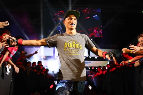 Australia's Reece McLaren walks down the ramp for his first bout in ONE Championship