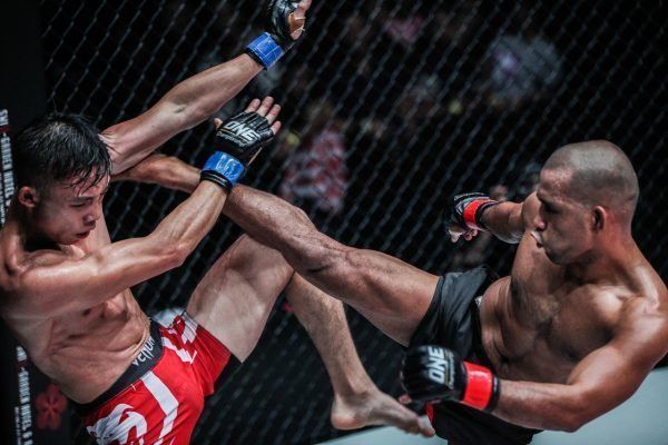 Philippine mixed martial artist Rene Catalan lands a roundhouse kick