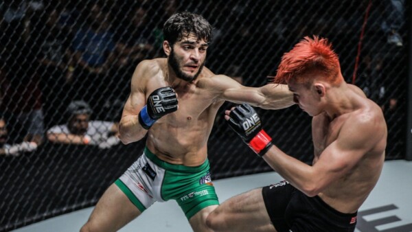 Pakistani mixed martial arts Ahmed Mujtaba strikes Benedict Ang in Singapore