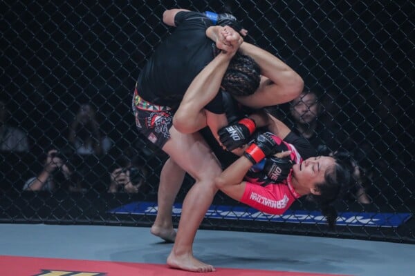 Rika Ishige locks in a triangle on Audreylaura Boniface