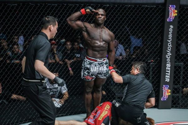 Hong Kong MMA fighter Alain Ngalani salutes after his record-setting win