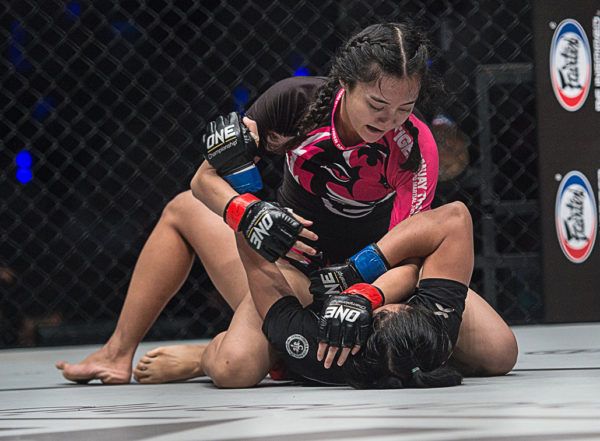 Bangkok's Rika "Tiny Doll" Ishige lands hard ground and pound from top position.