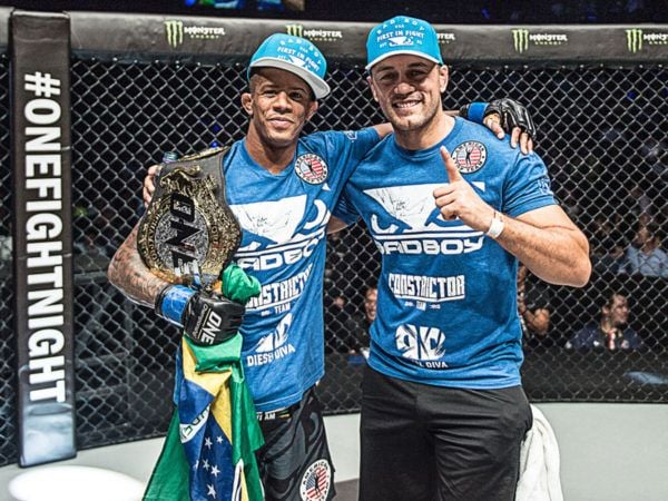 ONE Flyweight World Champion Adriano Moraes poses with the belt
