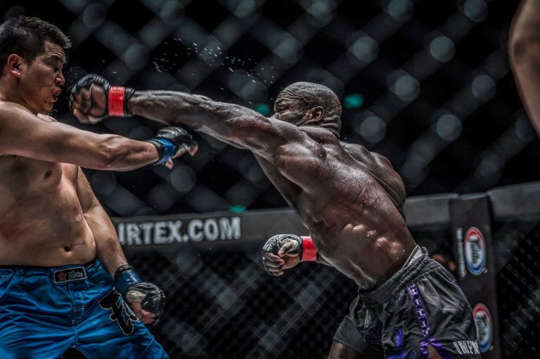 Hong Kong-based mixed martial artist Alain Ngalani throws a left hook