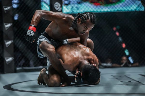 Malaysian sensation Muhammad Aiman punches Rin Saroth