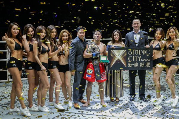 Geje Eustaquio with the ONE Championship World Title Belt