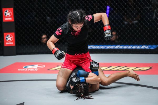 Malaysian mixed martial artist Jihin Radzuan unloads ground and pound on Priscilla Hertati Lumban Gaol