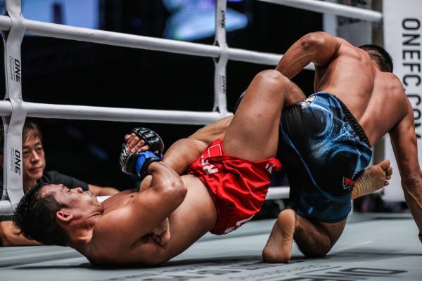 Filipino MMA fighter Robin Catalan locks in a heel hook on Adrian Mattheis