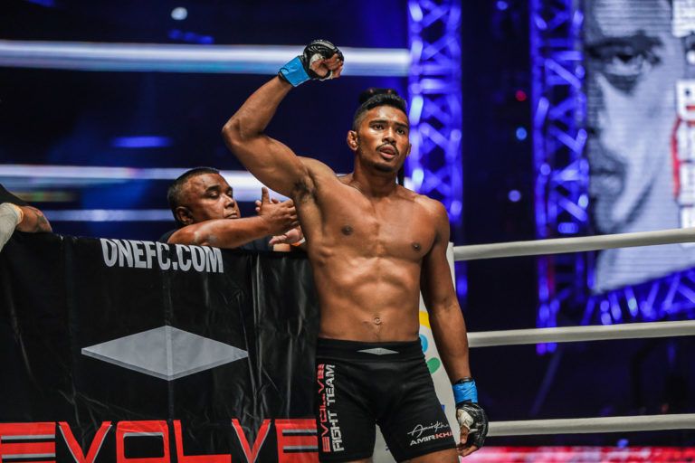 Singapore mixed martial artist Amir Khan with his dad, Tajudeen, in his corner