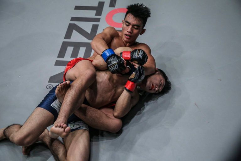 Joshua Pacio out-grappled Yoshitaka Naito to win the ONE Strawweight World Title