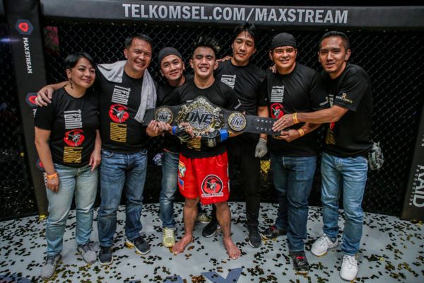 Joshua Pacio Poses With the ONE Strawweight World Title in Jakarta, Indonesia