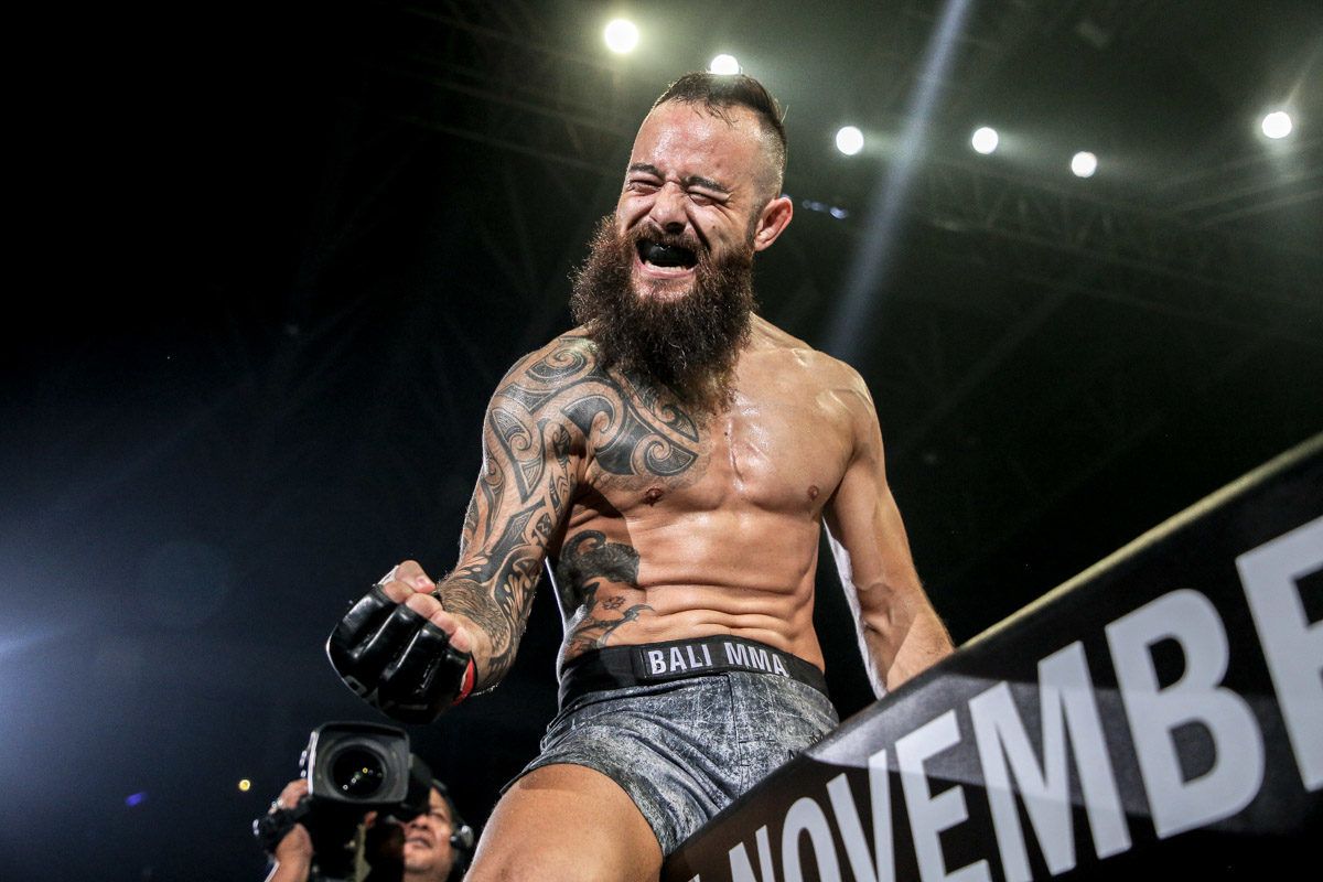 Dutch Indonesian MMA fighter Anthony Engelen climbs the Circle Wall