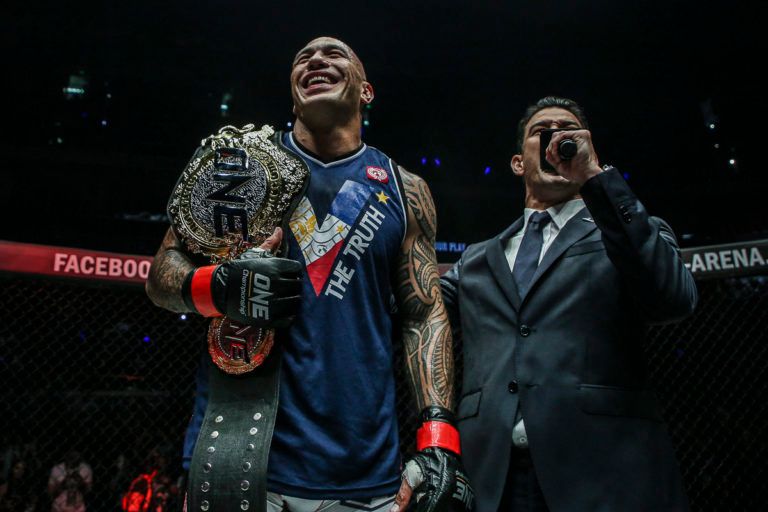 brandon vera with one heavyweight championship belt