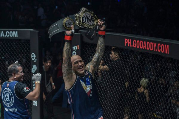 brandon vera with one heavyweight championship belt