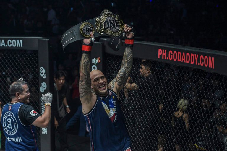 brandon vera with one heavyweight championship belt