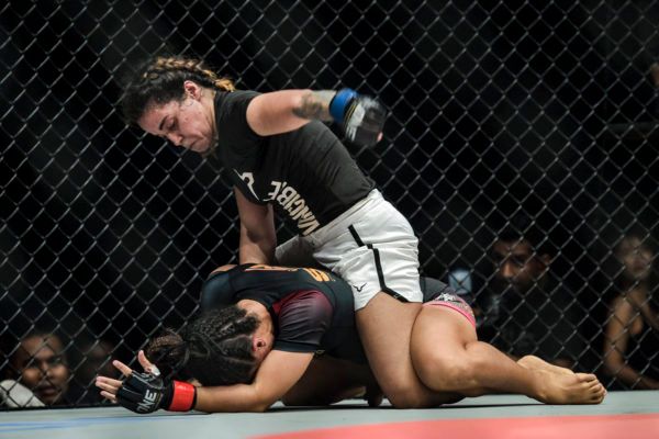 Indian Wushu Champion Puja Tomar unleashes ground and pound on Priscilla Hertati Lumban Gaol