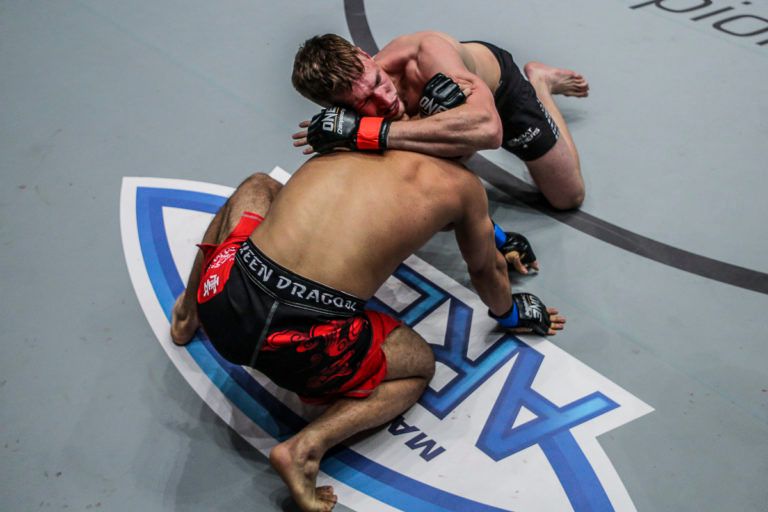 Holland's Renier De Ridder locks a D'Arce choke on Fan Rong