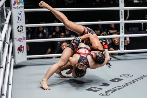 Japanese mixed martial artist Ayaka Miura throws Laura Balin