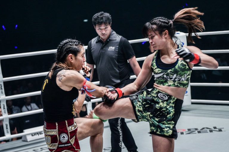 Stamp Fairtex kicks Janet Todd