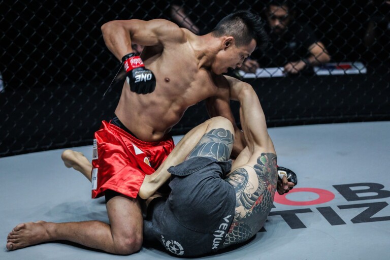 Filipino MMA fighter Edward Kelly punches Sung Jong Lee