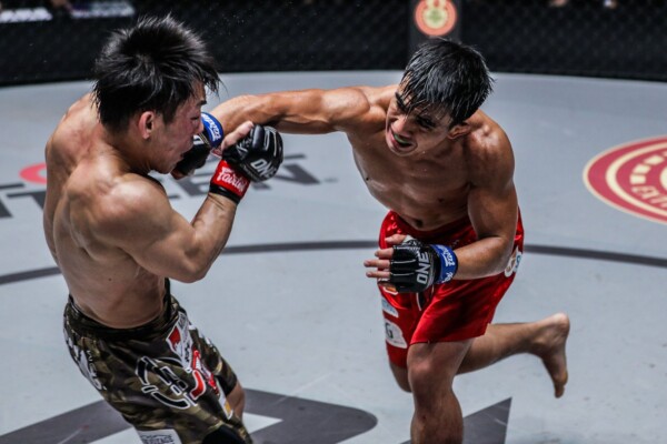 Filipino MMA fighter Joshua Pacio punches Yosuke Saruta