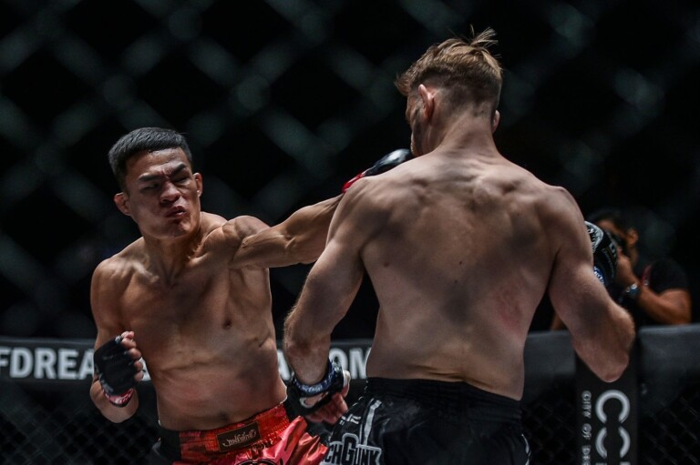 Thai martial arts star Saemapetch Fairtex connects with a left cross
