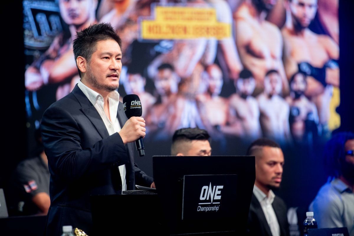 Chatri Sityodtong mans the podium for an announcement.