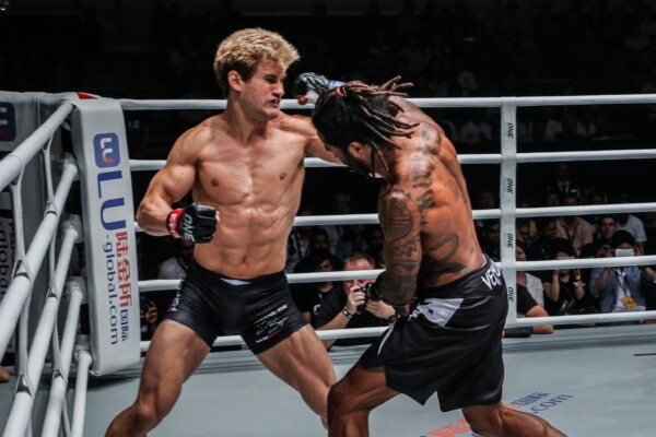 Brazilian knockout artist Cosmo Alexandre connects with an overhand right on Sage Northcut