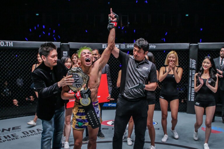 Petchdam Petchyindee Academy celebrates winning the ONE Flyweight Kickboxing World Title