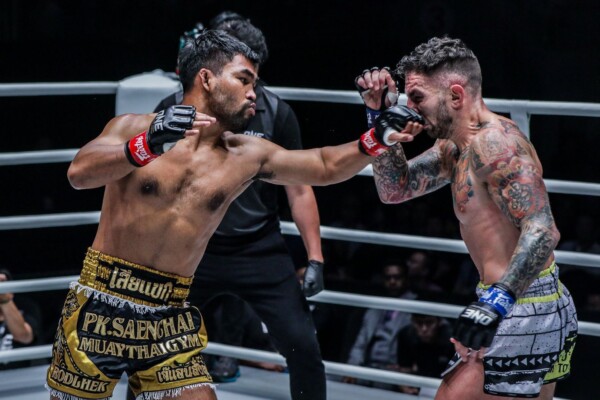 Muay Thai fighter Rodlek PK.Saenchai Muaythaigym jabs Liam Harrison