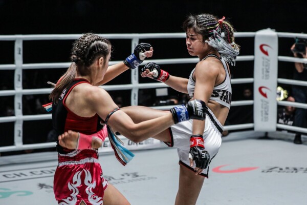 Stamp Fairtex lands a body kick to Alma Juniku at ONE: LEGENDARY QUEST in a ONE Atomweight Muay Thai World Championship defense.