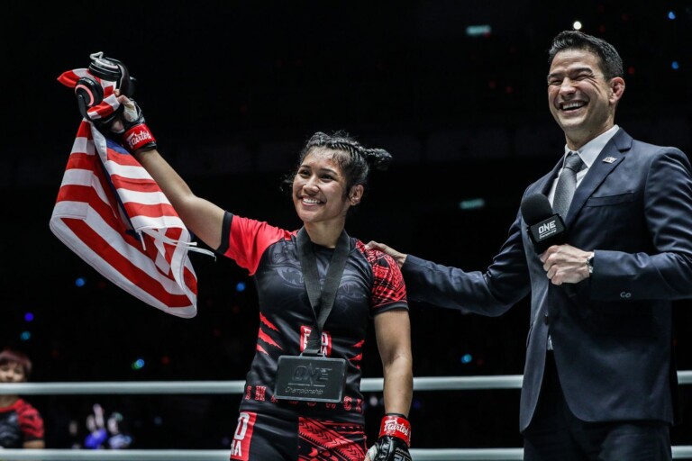 Malaysian atomweight mixed martial artist Jihin Radzuan with the flag