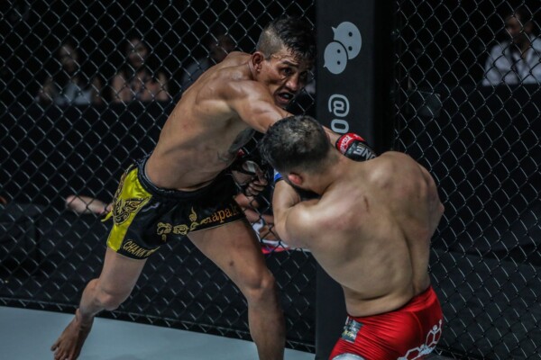 Cambodian martial arts star Chan Rothana punches Cuba's Gustavo Balart