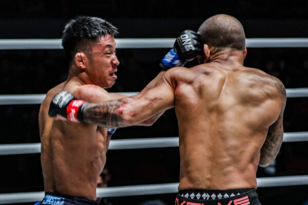 Daichi Takenaka throws a hard right hook to the head at ONE: DAWN OF HEROES.