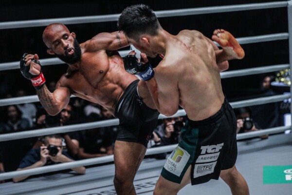 Japanese martial arts athlete Tatsumitsu Wada catches Demetrious Johnson's kick