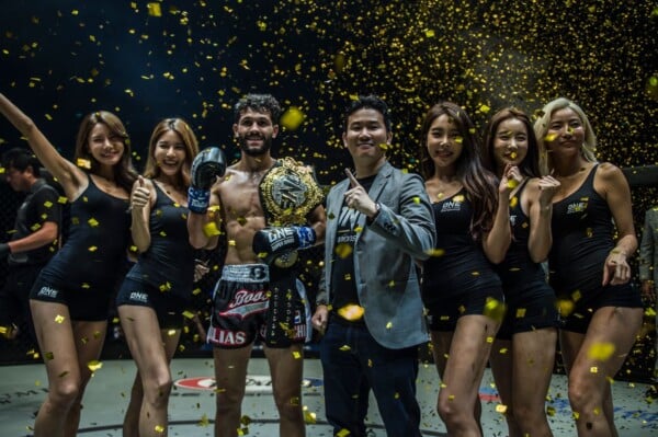 The Netherlands' Ilias Ennahachi celebrates as the new ONE Flyweight Kickboxing World Champion