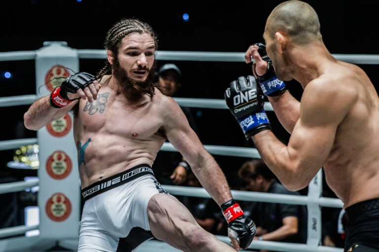James Nakashima kicks Yushin Okami while his beard sways