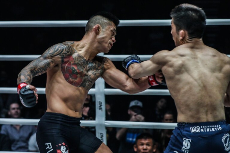 Martin Nguyen, ONE Featherweight World Champion, takes aim with a right hand as Koyomi Matsushima throws a left.