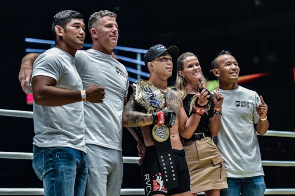 Martin Nguyen holds his title belt alongside Aung La N Sang, Henri Hooft, Tial Thang