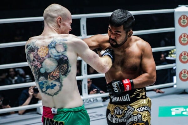 Rodlek PK.Saenchaimuaythaigym lands a right hand on Andrew Miller at ONE: DAWN OF HEROES.