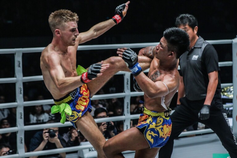 Rodtang Jitmuangnon sweeps his rival to the canvas in their Muay Thai bout in Manila.