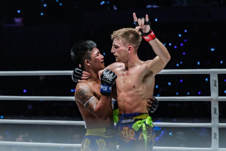 Jonathan Haggerty and Rodtang Jitmuangnon embrace after their ONE Flyweight Muay Thai World Title bout in Manila.