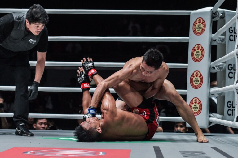"The Stalker" Xie Bin connects with a punch on Team Lakay's Edward Kelly in Manila, Philippines