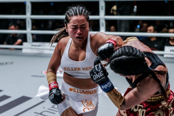Vietnam mixed martial artist Bi Nguyen charges forward with a punch