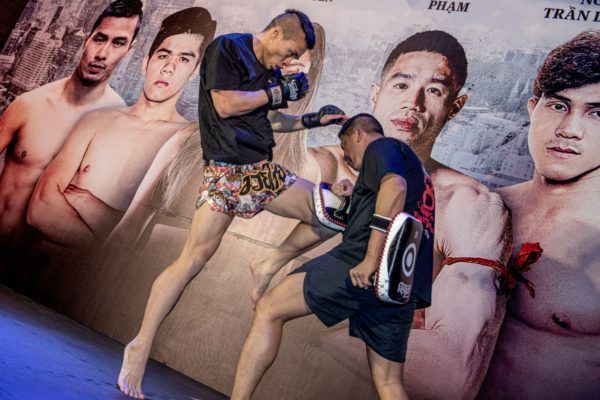 Chris Nguyen hits pads at the ONE: IMMORTAL TRIUMPH open workout in Ho Chi Minh City, Vietnam