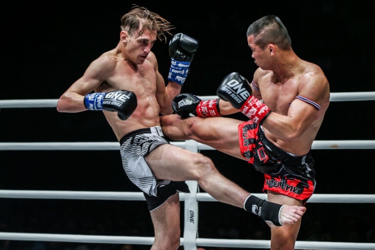 Nong-O connects with another fierce body kick