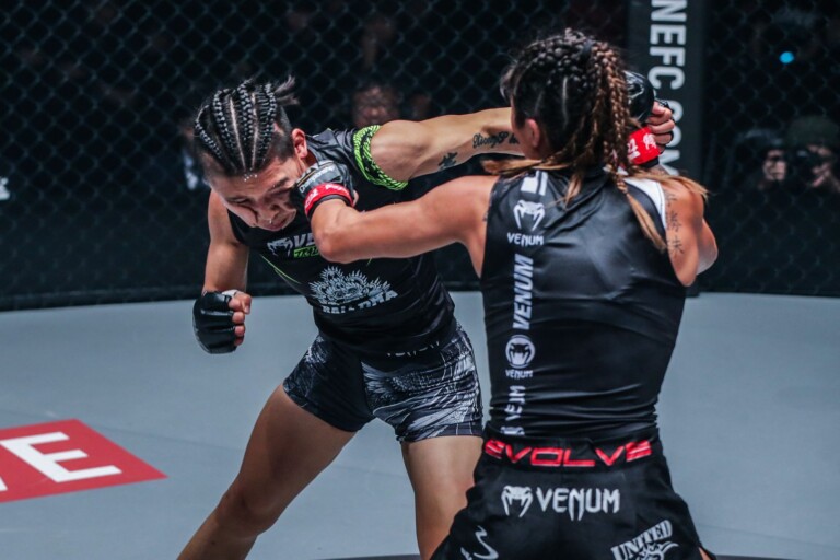 Singapore's Angela Lee strikes with China's Xiong Jing Nan in their second bout at ONE: CENTURY PART I in October 2019