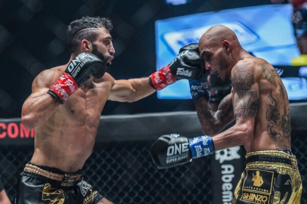 Giorgio Petrosyan punches Samy sAna with a jab