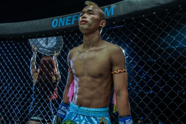Chinese kickboxer Wang Junguang prepares to fight